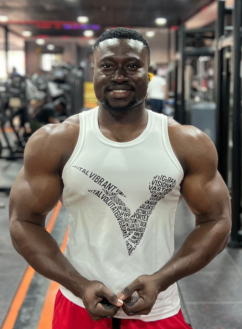 Athlete posing confidently in the gym