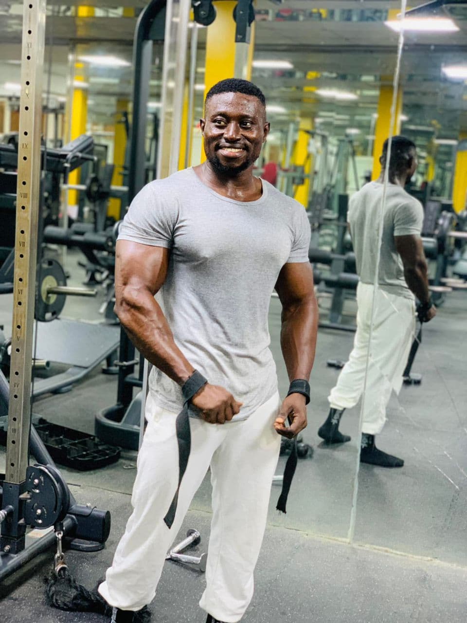 Athlete smiling in the gym after a workout